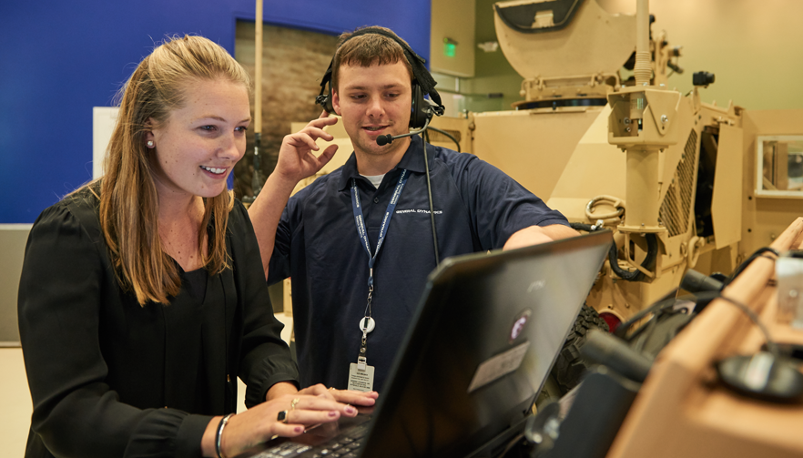 Engineers work on WIN-T equipment