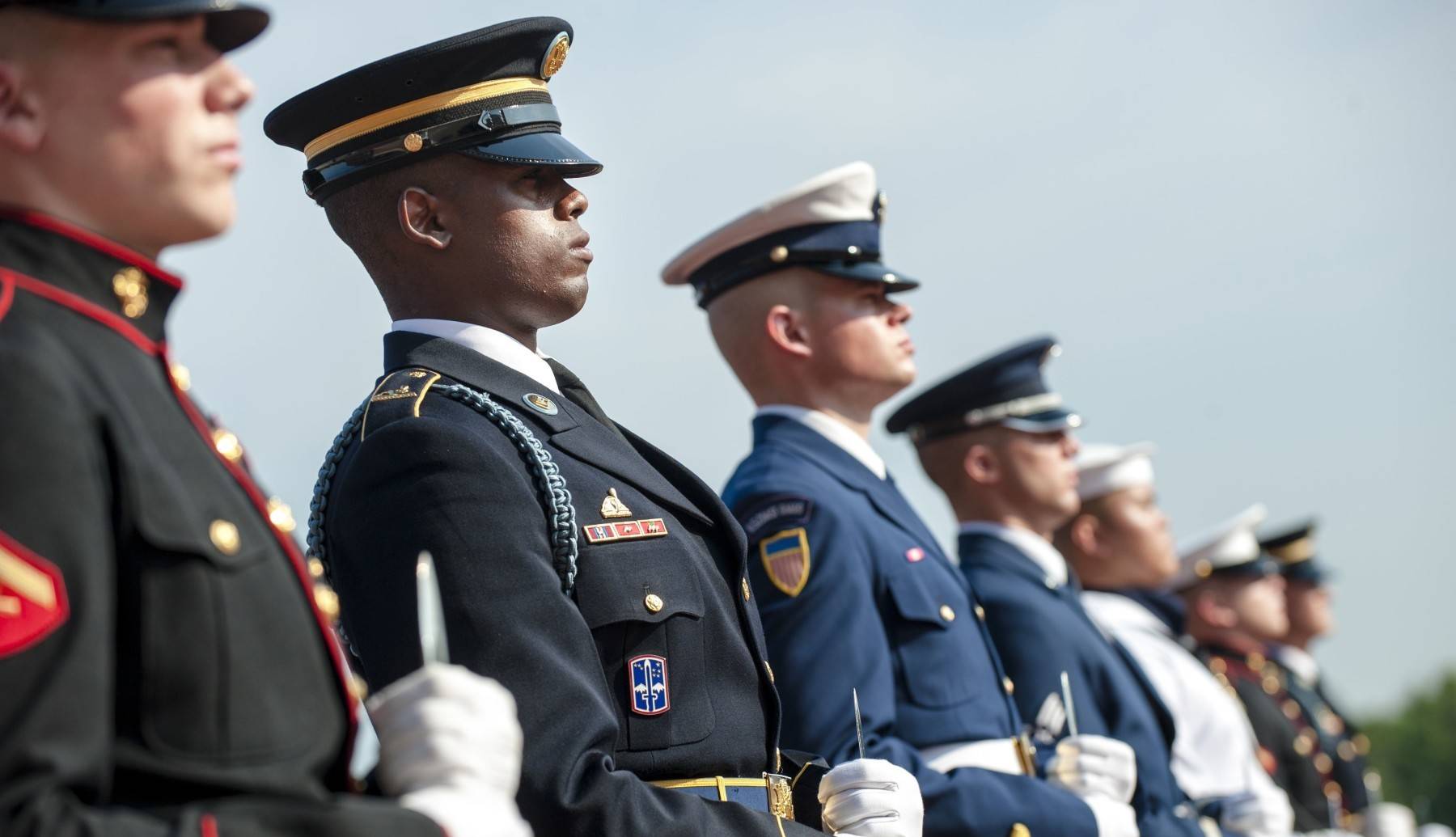 Members of all 5 branches of the military honor guard