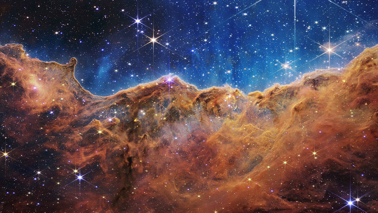 JWST First Images - Cosmic Cliffs in the Carina Nebula