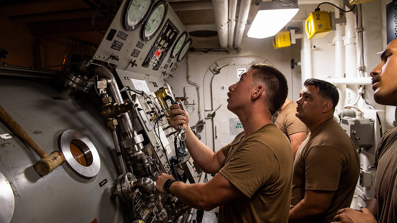 Sailors Conduct Shipboard Maintenance Ship Interior