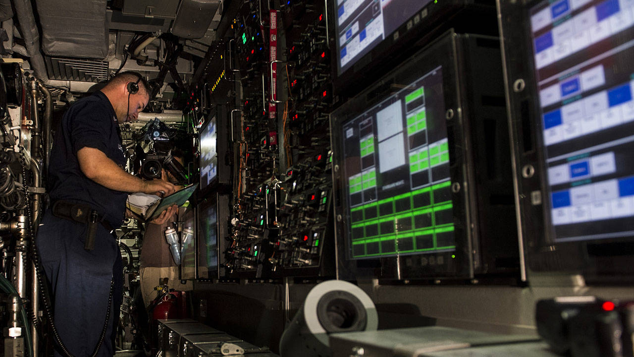Sailor initiates simulated torpedo launch aboard Virginia-class submarine SSN 783
