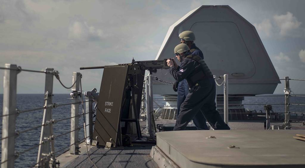 LCS 4 USS Coronado sailors fire machine gun