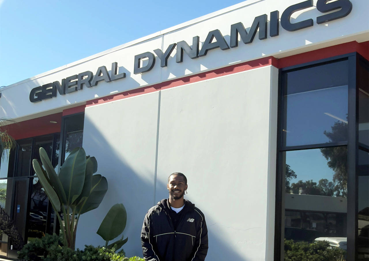 AJ in front of GD building