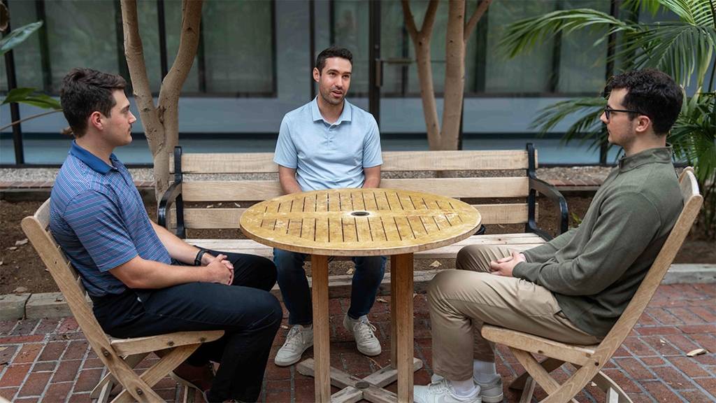 Jace Having Team Discussion Outside